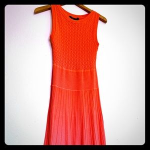Peach BCBG dress.
